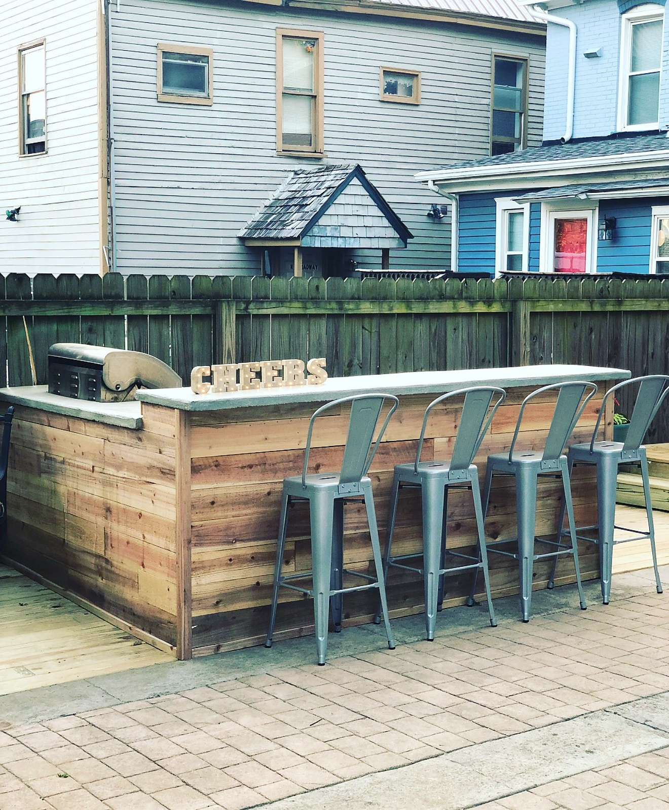Cedar outdoor bar with seating for four