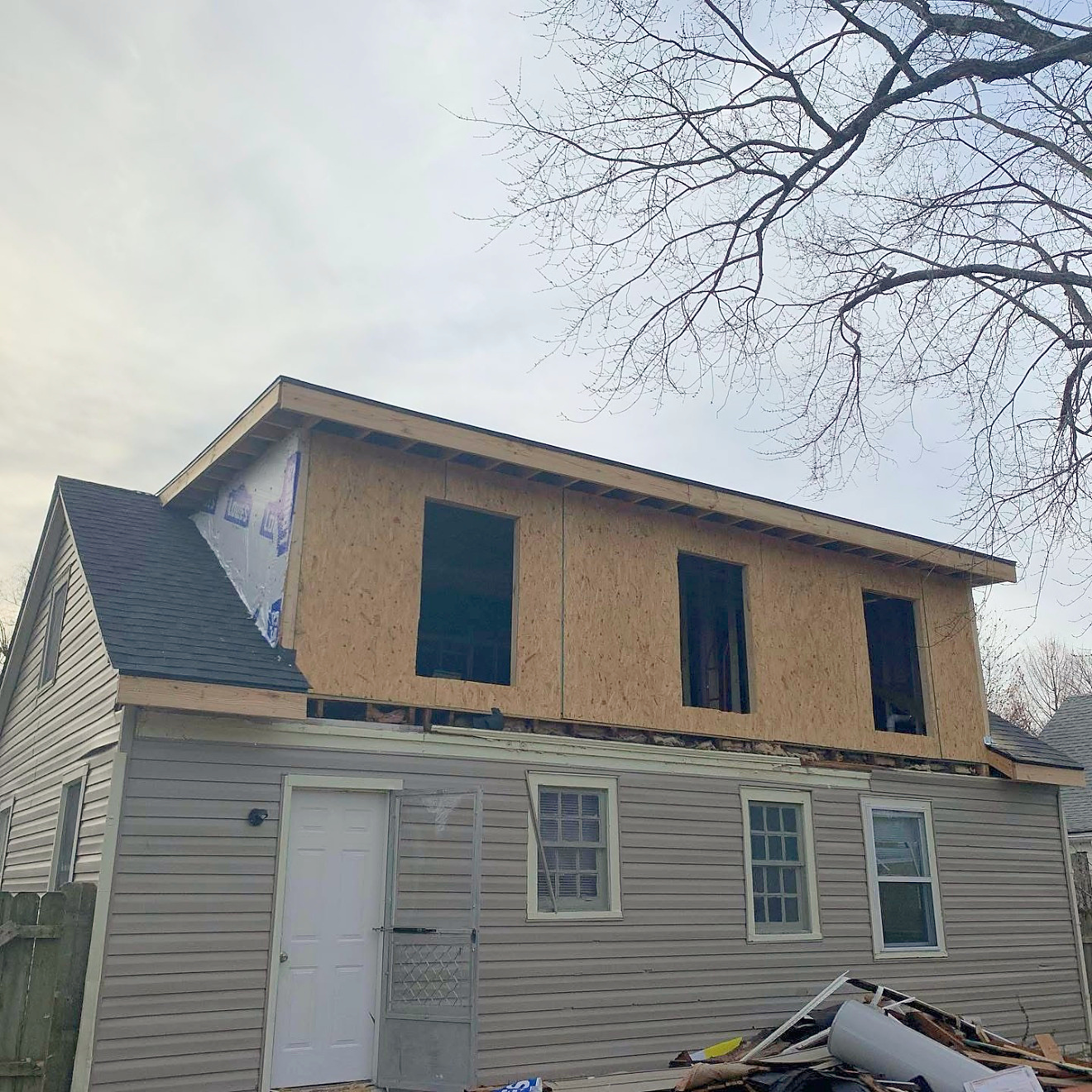 Second-story dormer addition at the framing stage